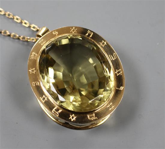 An unmarked gold coloured metal Masonic jewel pendant on 9ct. gold chain